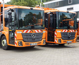 Zwei Müllfahrzeuge